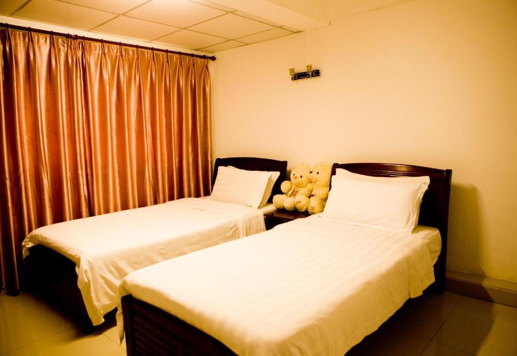 Sanya Hairulan Hotel Szoba fotó